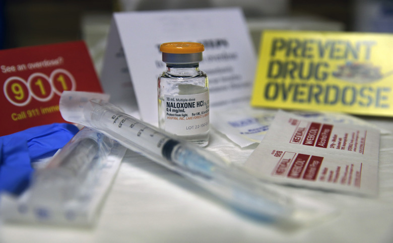 A kit with naloxone. An opiate overdose essentially makes the body forget to breathe. Naloxone works by blocking the brain receptors that opiates latch onto, helping the body “remember” to take in air. (Mel Evans/ASSOCIATED PRESS)