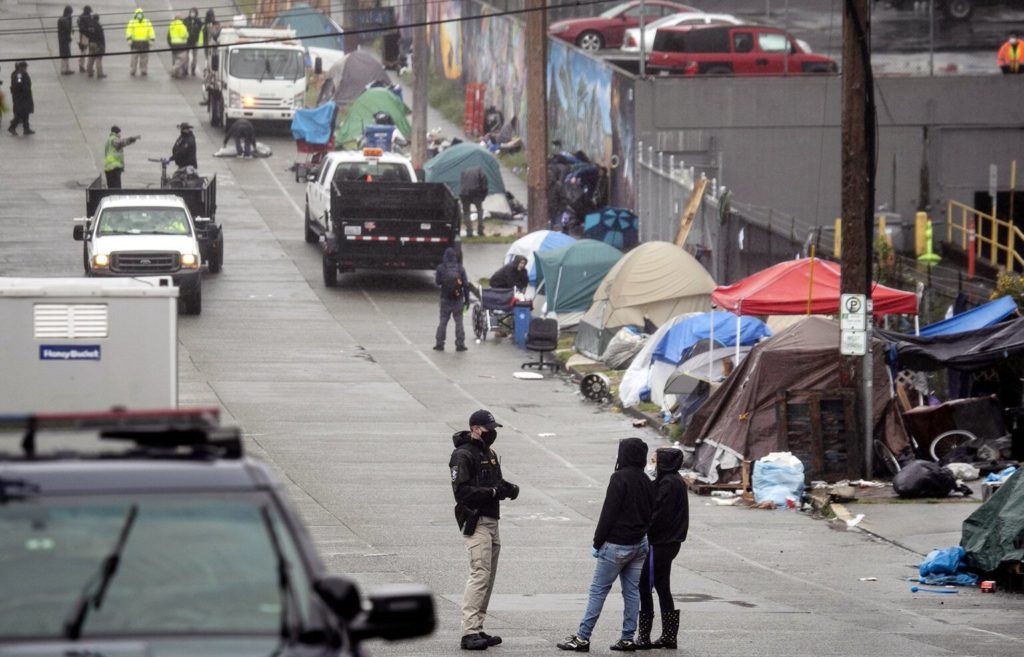 Seattle City Council votes to defund team that removes homeless encampments, in victory for activists
