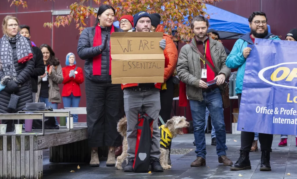 Social service workers rally at Seattle City Hall over proposed budget cuts