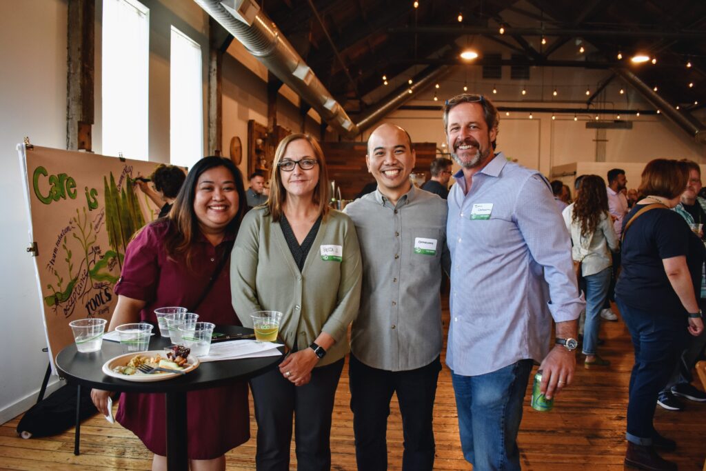 Four ETS team members smile for a picture.