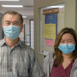 Yoji, left, is the head of ETS's acupuncture department.